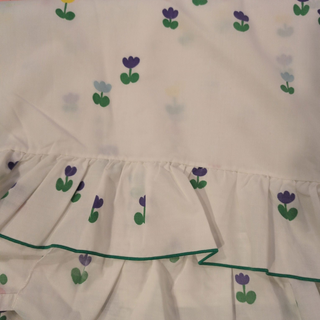Amelia - top sheet - tiny purple and yellow tulips on a bright white sheet with ruffled border and green edge - Artful Accumulator Boutique Vintage