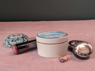"Clouds & Blue Skies" a very, very small oval trinket jar with imagery of clouds and silver edging on fitted lid -  - #tag1# - #tag2# - #tag3# - #tag4# - the Artful Accumulator's Vintage Boutique