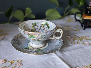 Iridescent Floral Tea cup & saucer, light blue with white flowers and green leaves -  - #tag1# - #tag2# - #tag3# - #tag4# - the Artful Accumulator's Vintage Boutique