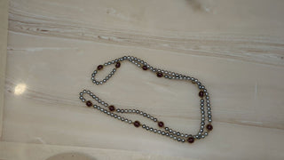 Long necklace with violet pearl beads and gold accents - Artful Accumulator Boutique Vintage