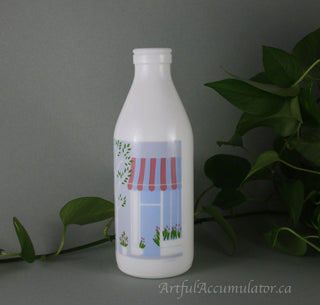 Milk Glass Bottle by Arpac with design: trees with leaves, flowers, storefront -  - #tag1# - #tag2# - #tag3# - #tag4# - the Artful Accumulator's Vintage Boutique