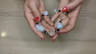 Oblong Swirled Organic White Beads with faceted round Clear and black with a crystal-covered box clasp - Artful Accumulator Boutique Vintage