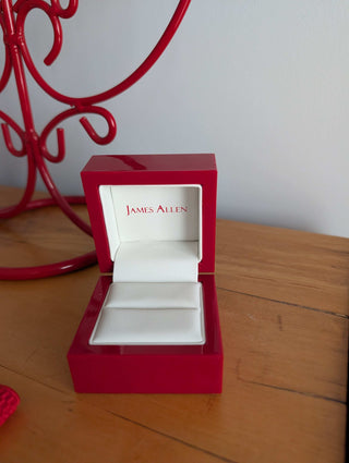 Red Ring Box made with hard plastic, metal hinge, clamshell style