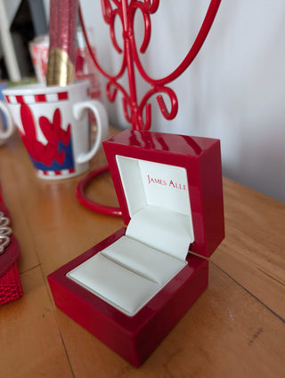 Red Ring Box made with hard plastic, metal hinge, clamshell style