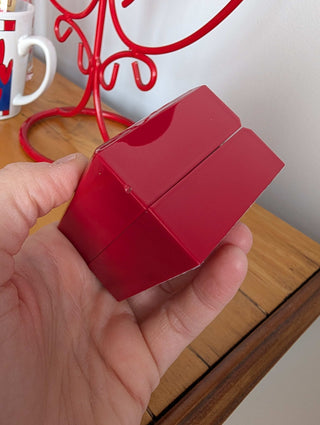 Red Ring Box made with hard plastic, metal hinge, clamshell style