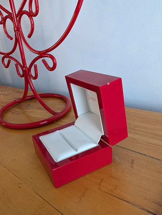 Red Ring Box made with hard plastic, metal hinge, clamshell style