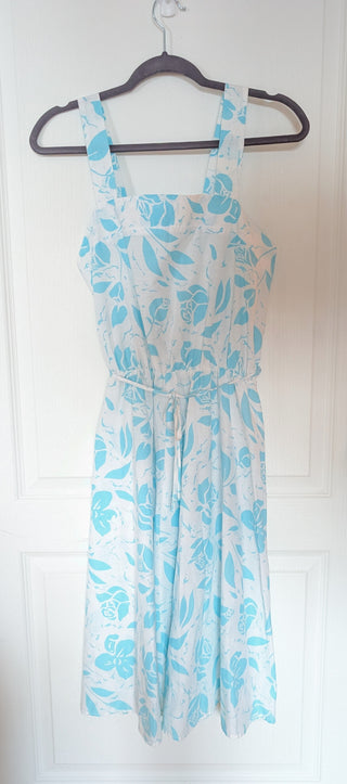 Dress - apron style - bright blue roses on a bright white, unlined lightweight fabric