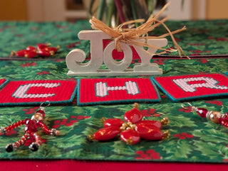 small JOY! banner with straw bow and ivory enamel