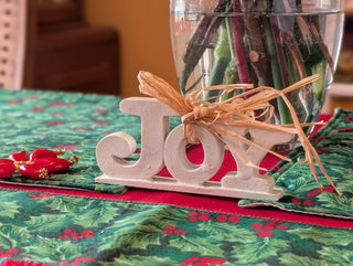 small JOY! banner with straw bow and ivory enamel
