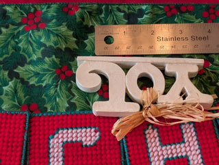 small JOY! banner with straw bow and ivory enamel