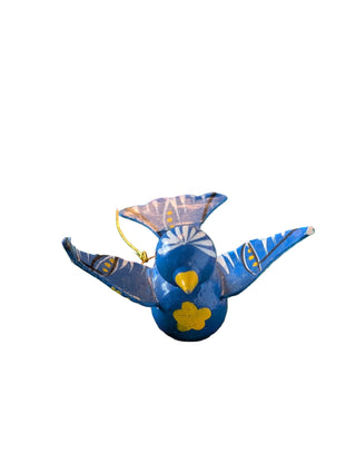 Blue decorative bird ornament on white background