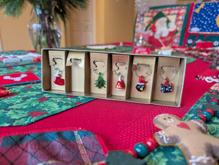 party set of 5 Christmas-themed wine charms made from lamp-worked glass