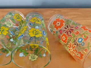 Trio of medium-sized tumblers with orange and green floral patterns - Artful Accumulator Boutique Vintage