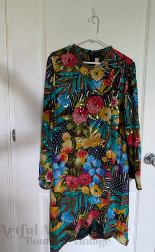 Multicolour sequin layered dress with sheer fabric, bright florals, and a beaded neackline