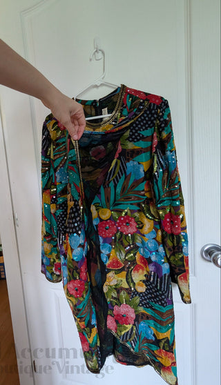 Multicolour sequin layered dress with sheer fabric, bright florals, and a beaded neackline