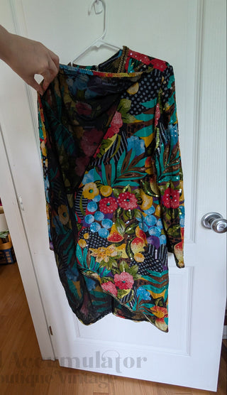 Multicolour sequin layered dress with sheer fabric, bright florals, and a beaded neackline
