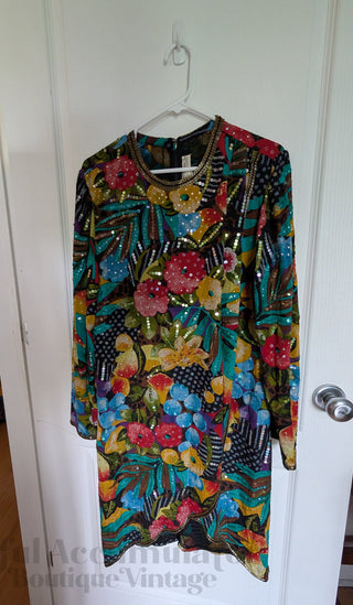 Multicolour sequin layered dress with sheer fabric, bright florals, and a beaded neackline