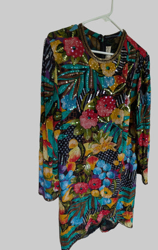 Multicolour sequin layered dress with sheer fabric, bright florals, and a beaded neackline