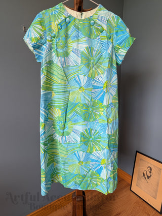 Green and blue striped flower shift dress with button accents