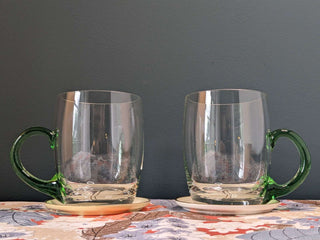 pair of clear glass mugs, handblown, green handle, volume 500ml -  - #tag1# - #tag2# - #tag3# - #tag4# - the Artful Accumulator's Vintage Boutique