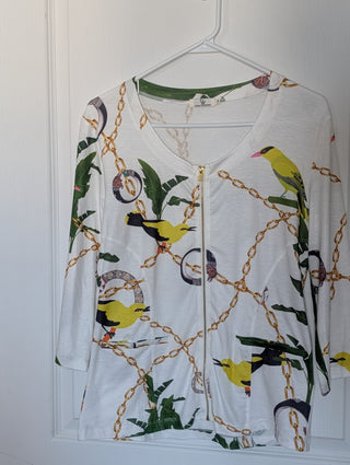 Modern * white zip up cardigan with imagery of jewels, gold chains, and yellow birds